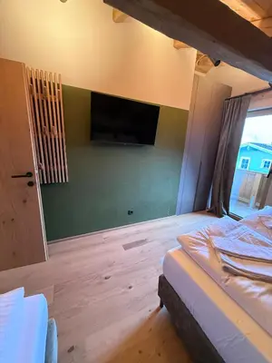 Ein Bett oder Betten in einem Zimmer der Unterkunft GOLDMARIE - Apartments