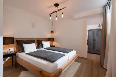 Ein Bett oder Betten in einem Zimmer der Unterkunft Zellberger Auszeit