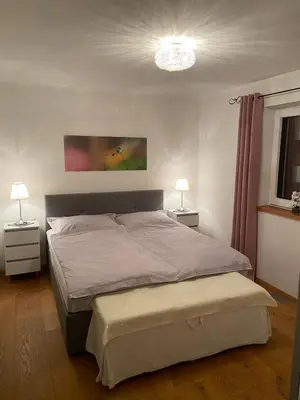 Ein Bett oder Betten in einem Zimmer der Unterkunft Haus Kaiserblick Top 1