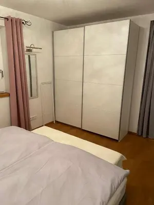 Ein Bett oder Betten in einem Zimmer der Unterkunft Haus Kaiserblick Top 1