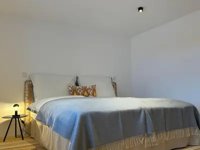 Ein Bett oder Betten in einem Zimmer der Unterkunft Simair in Haus