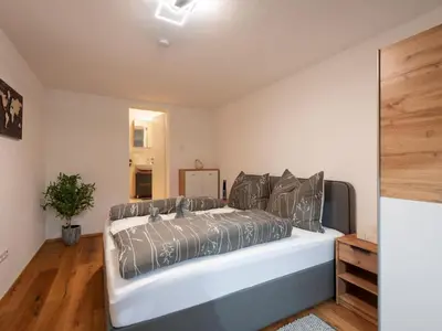 Ein Bett oder Betten in einem Zimmer der Unterkunft Almblick