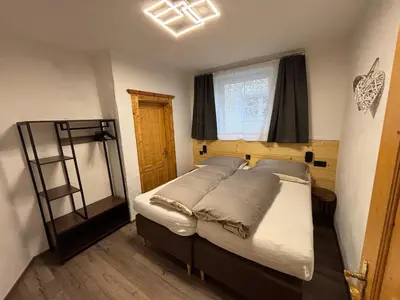 Ein Bett oder Betten in einem Zimmer der Unterkunft Schattberg