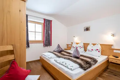 Ein Bett oder Betten in einem Zimmer der Unterkunft Ferienwohnung Panoramablick