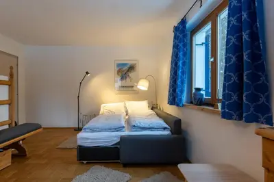 Ein Bett oder Betten in einem Zimmer der Unterkunft Haus Fini - Ski In Ski Out