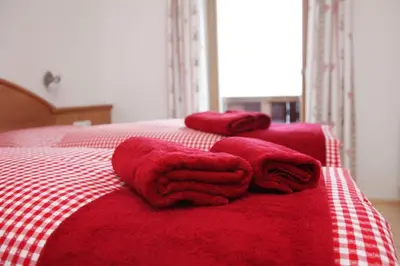 Ein Bett oder Betten in einem Zimmer der Unterkunft Hennleiten Hütte