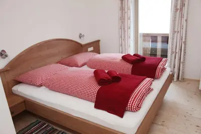 Ein Bett oder Betten in einem Zimmer der Unterkunft Hennleiten Hütte