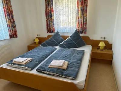 Ein Bett oder Betten in einem Zimmer der Unterkunft Appartement Lemberger - Biohof Stallfeld