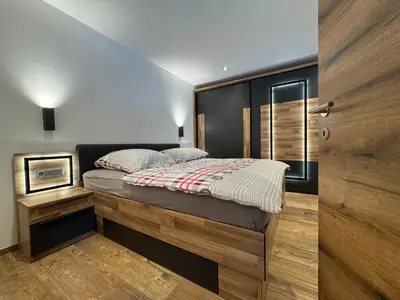 Ein Bett oder Betten in einem Zimmer der Unterkunft Feriendomizil Garber-Bründl