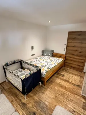 Ein Bett oder Betten in einem Zimmer der Unterkunft Feriendomizil Garber-Bründl