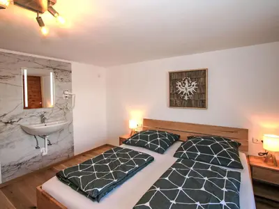 Ein Bett oder Betten in einem Zimmer der Unterkunft Apartment Bettina by Interhome