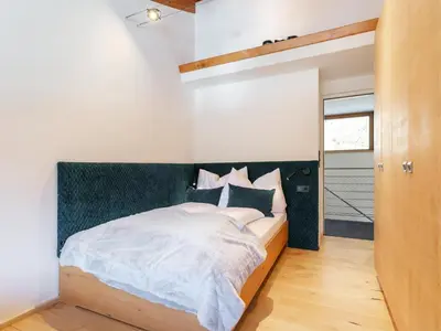 Ein Bett oder Betten in einem Zimmer der Unterkunft Im Wald