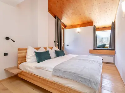 Ein Bett oder Betten in einem Zimmer der Unterkunft Im Wald