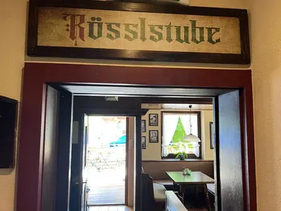 Ein Zertifikat, Auszeichnung, Logo oder anderes Dokument, das in der Unterkunft Weisses Rössl am See ausgestellt ist