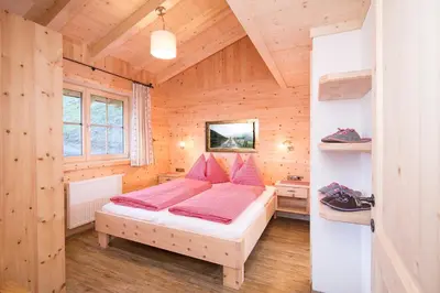 Ein Bett oder Betten in einem Zimmer der Unterkunft Chalet Friedlach