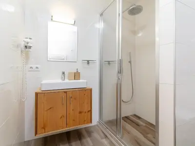 Ein Badezimmer in der Unterkunft Waidachhaus 10
