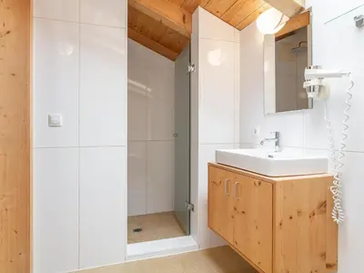 Ein Badezimmer in der Unterkunft Waidachhaus 10