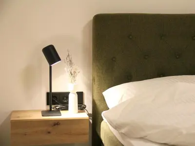 Ein Bett oder Betten in einem Zimmer der Unterkunft BLEIBE - Apartment im Zillertal