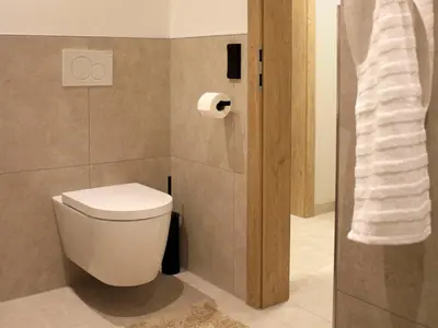 Ein Badezimmer in der Unterkunft BLEIBE - Apartment im Zillertal