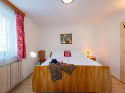 Ein Bett oder Betten in einem Zimmer der Unterkunft Farmhouse in Ramsau near Ski Slopes