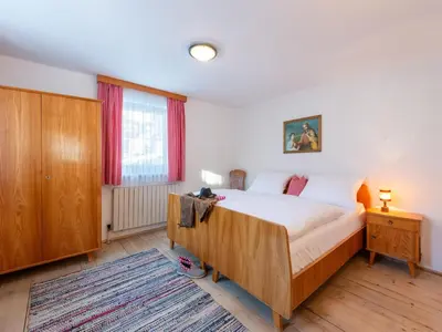 Ein Bett oder Betten in einem Zimmer der Unterkunft Farmhouse in Ramsau near Ski Slopes