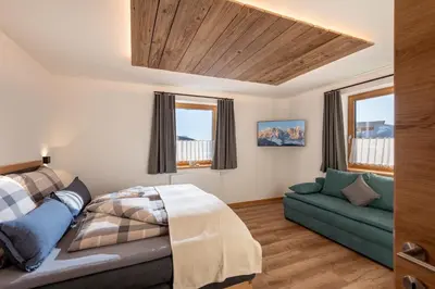 Ein Bett oder Betten in einem Zimmer der Unterkunft Hinterschiesslinghof