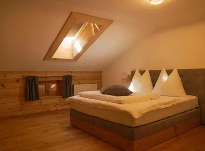 Ein Bett oder Betten in einem Zimmer der Unterkunft Apartments Wiglhof