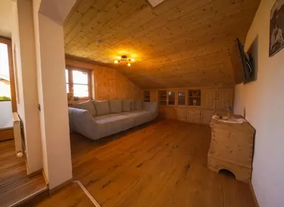 Ein Sitzbereich in der Unterkunft Apartments Wiglhof