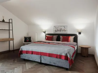 Ein Bett oder Betten in einem Zimmer der Unterkunft Mountain King Chalet