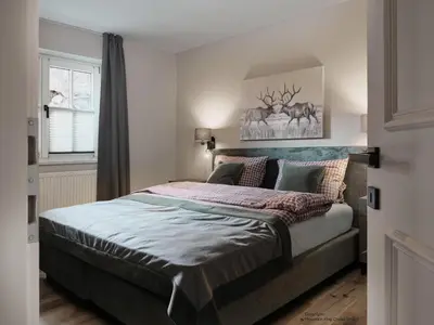 Ein Bett oder Betten in einem Zimmer der Unterkunft Mountain King Chalet