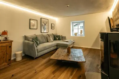 Ein Sitzbereich in der Unterkunft Appartements Gasthof Traube Top 2