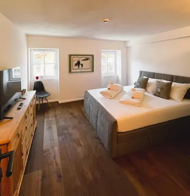 Ein Bett oder Betten in einem Zimmer der Unterkunft Appartements Gasthof Traube Top 2