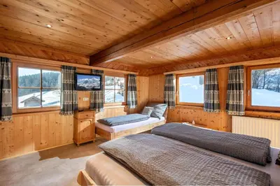 Ein Bett oder Betten in einem Zimmer der Unterkunft Bartlerhof