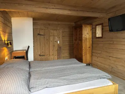 Ein Bett oder Betten in einem Zimmer der Unterkunft Bartlerhof