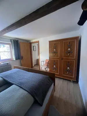 Ein Bett oder Betten in einem Zimmer der Unterkunft Prosthäusl 1866