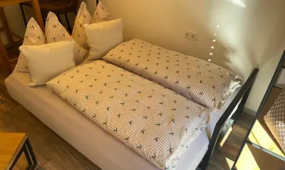 Ein Bett oder Betten in einem Zimmer der Unterkunft Appartement Mountain Lake