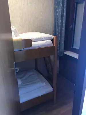 Ein Bett oder Betten in einem Zimmer der Unterkunft Familienappartement Talblick by Hermann Weiss