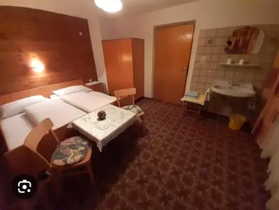 Ein Bett oder Betten in einem Zimmer der Unterkunft Urlaub am Antritthof