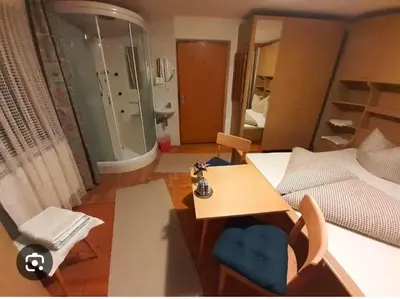 Ein Bett oder Betten in einem Zimmer der Unterkunft Urlaub am Antritthof