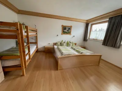 Ein Bett oder Betten in einem Zimmer der Unterkunft Ferienwohnungen Prosser