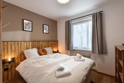 Ein Bett oder Betten in einem Zimmer der Unterkunft Aufi Gehts by Apartment Managers