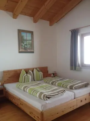 Ein Bett oder Betten in einem Zimmer der Unterkunft Ferienwohnungen Prosser
