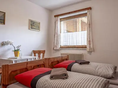 Ein Bett oder Betten in einem Zimmer der Unterkunft Zaustoi