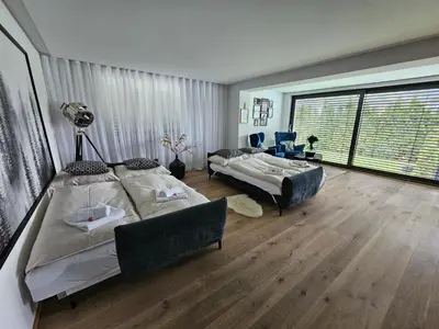 Ein Bett oder Betten in einem Zimmer der Unterkunft Apartments Shema