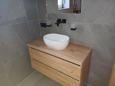 Ein Badezimmer in der Unterkunft Apartment Alpenland