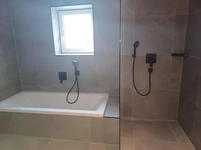 Ein Badezimmer in der Unterkunft Apartment Alpenland
