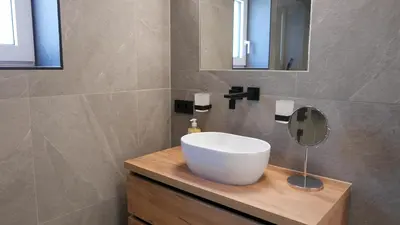 Ein Badezimmer in der Unterkunft Apartment Alpenland