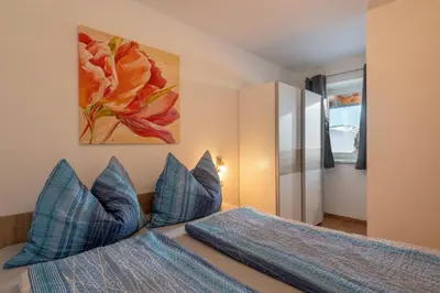 Ein Bett oder Betten in einem Zimmer der Unterkunft Appartement AN DER PISTE