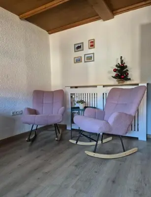 Ein Sitzbereich in der Unterkunft Ferienwohnung Bergliebe