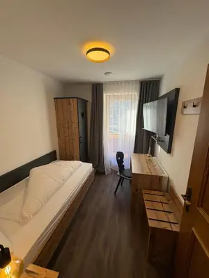 Ein Bett oder Betten in einem Zimmer der Unterkunft Pension Kohler